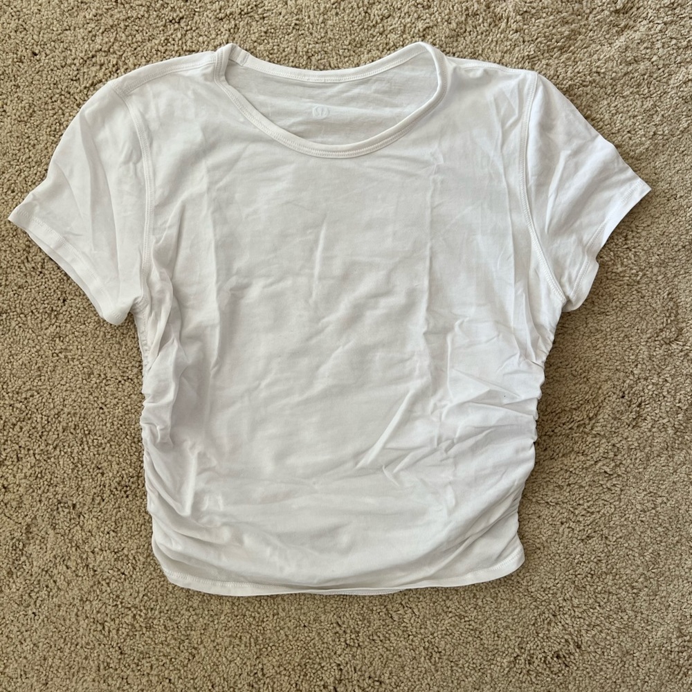 Lulu cropped short sleeve with side ruching.